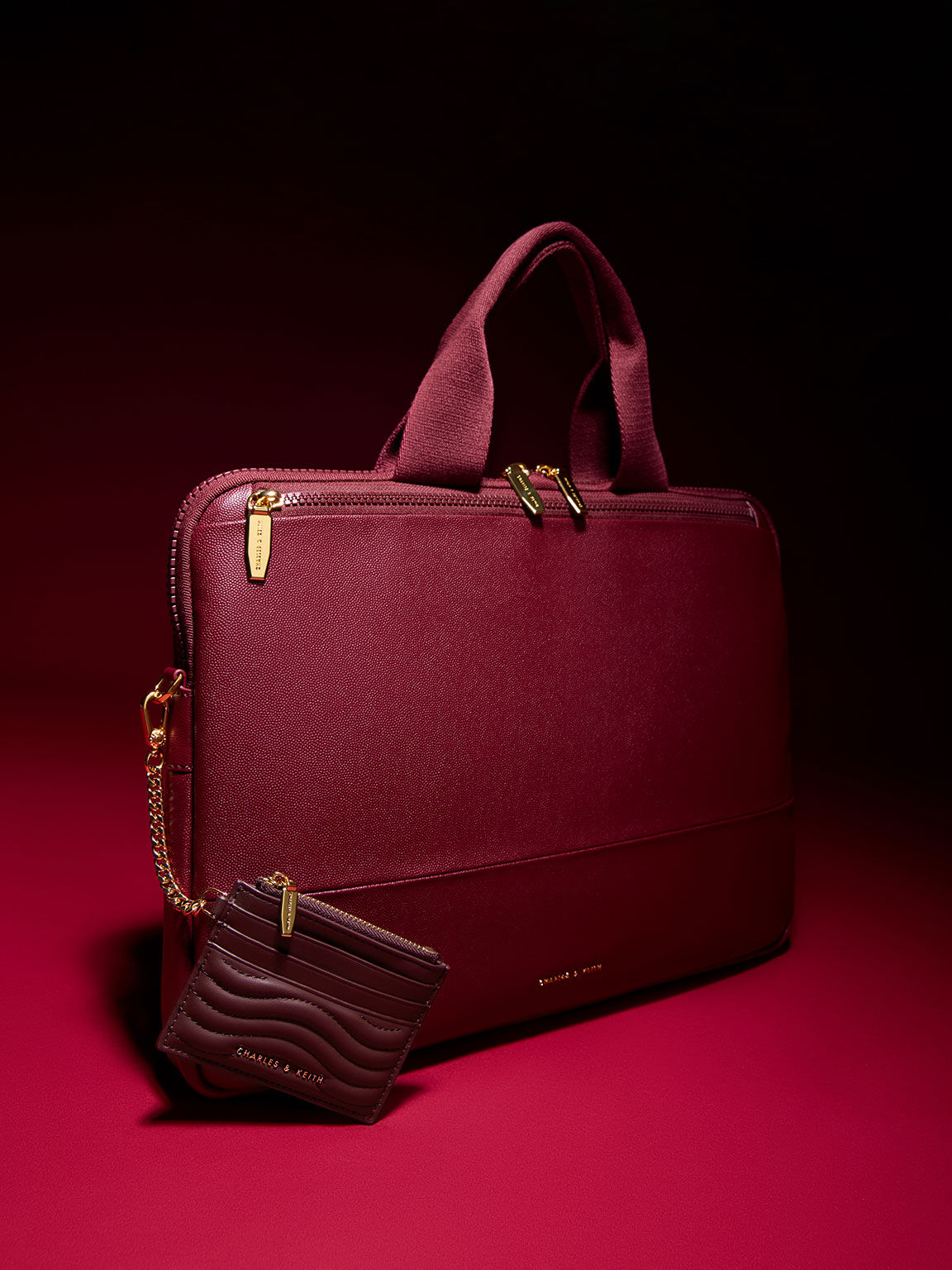 Charles and sales keith maroon bag