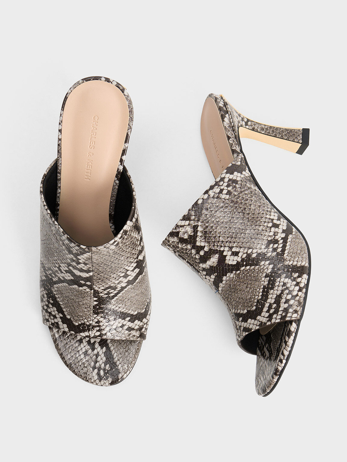 Snakeskin heeled mules 2025