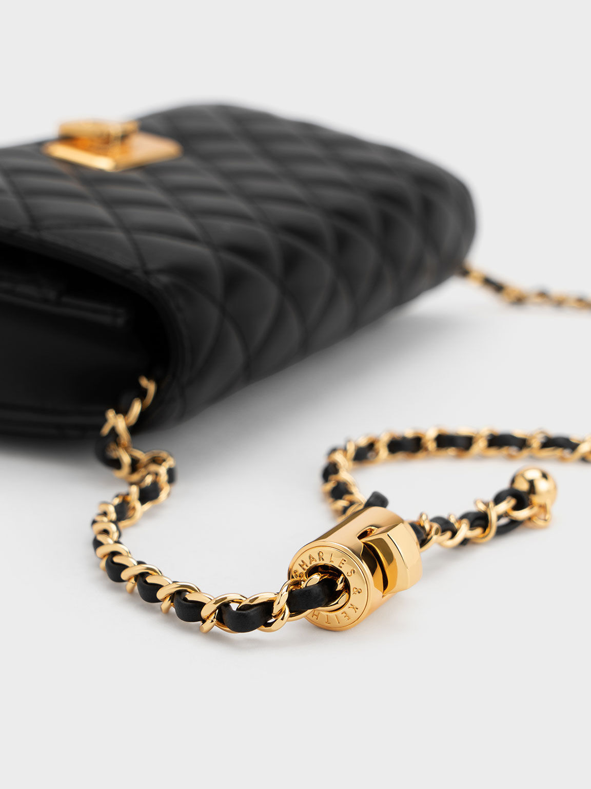 Quilted clutch charles top and keith