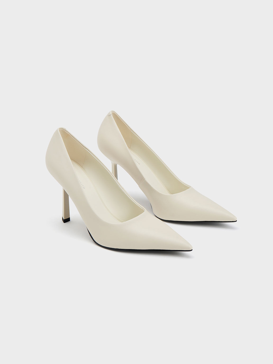 White pointy toe store pumps