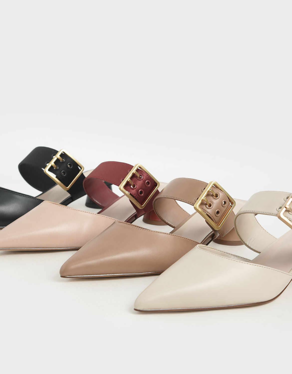 Buckle mules clearance