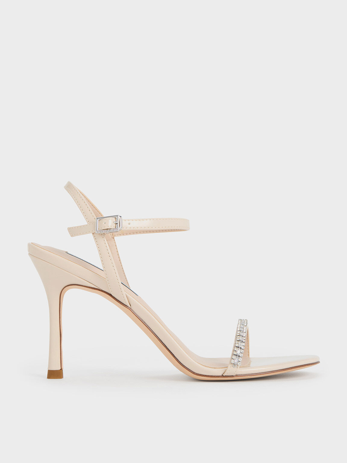 Cream high heels top with ankle strap