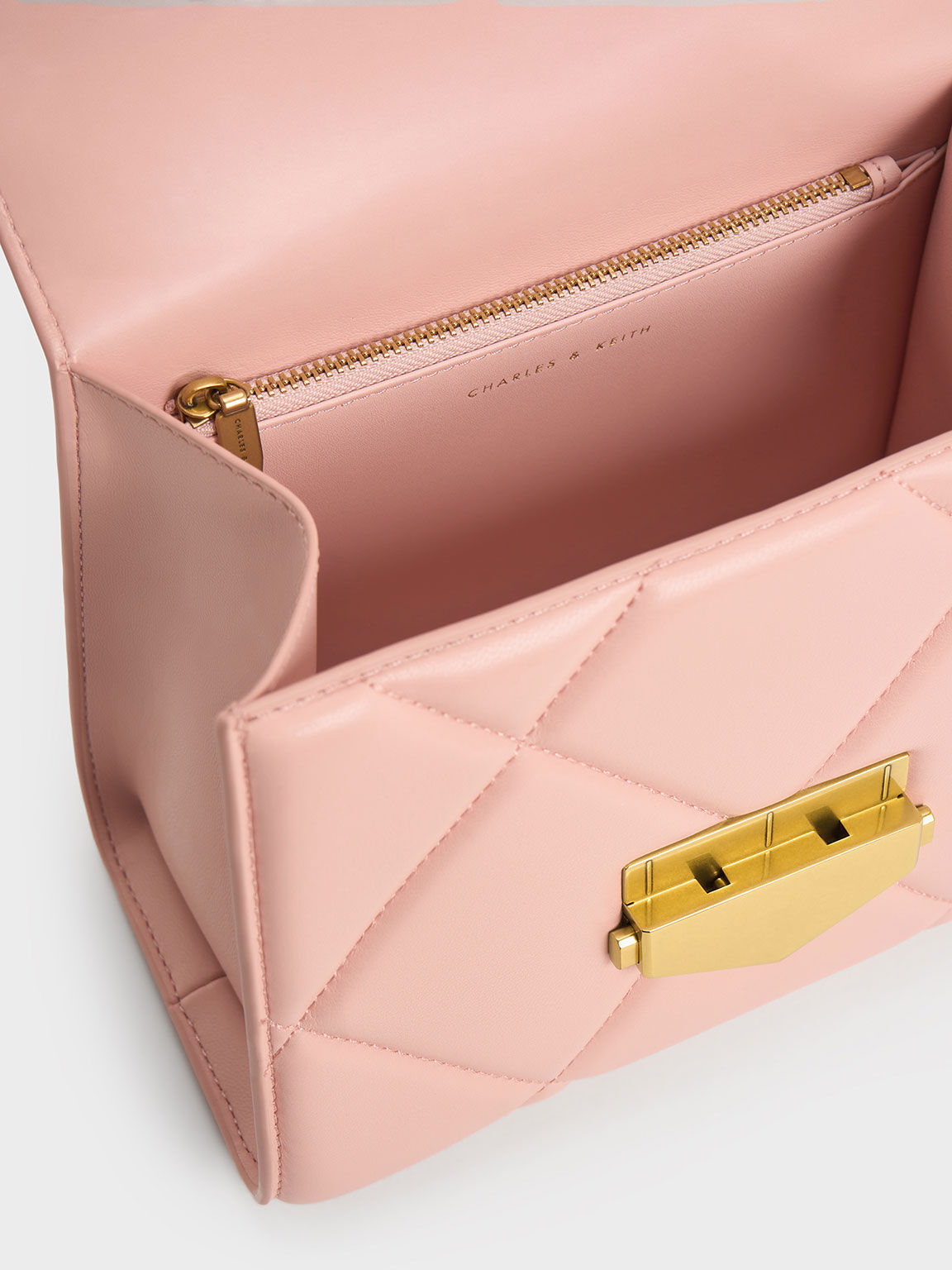 Pink Vertigo Quilted Trapeze Top Handle Bag CHARLES KEITH SG
