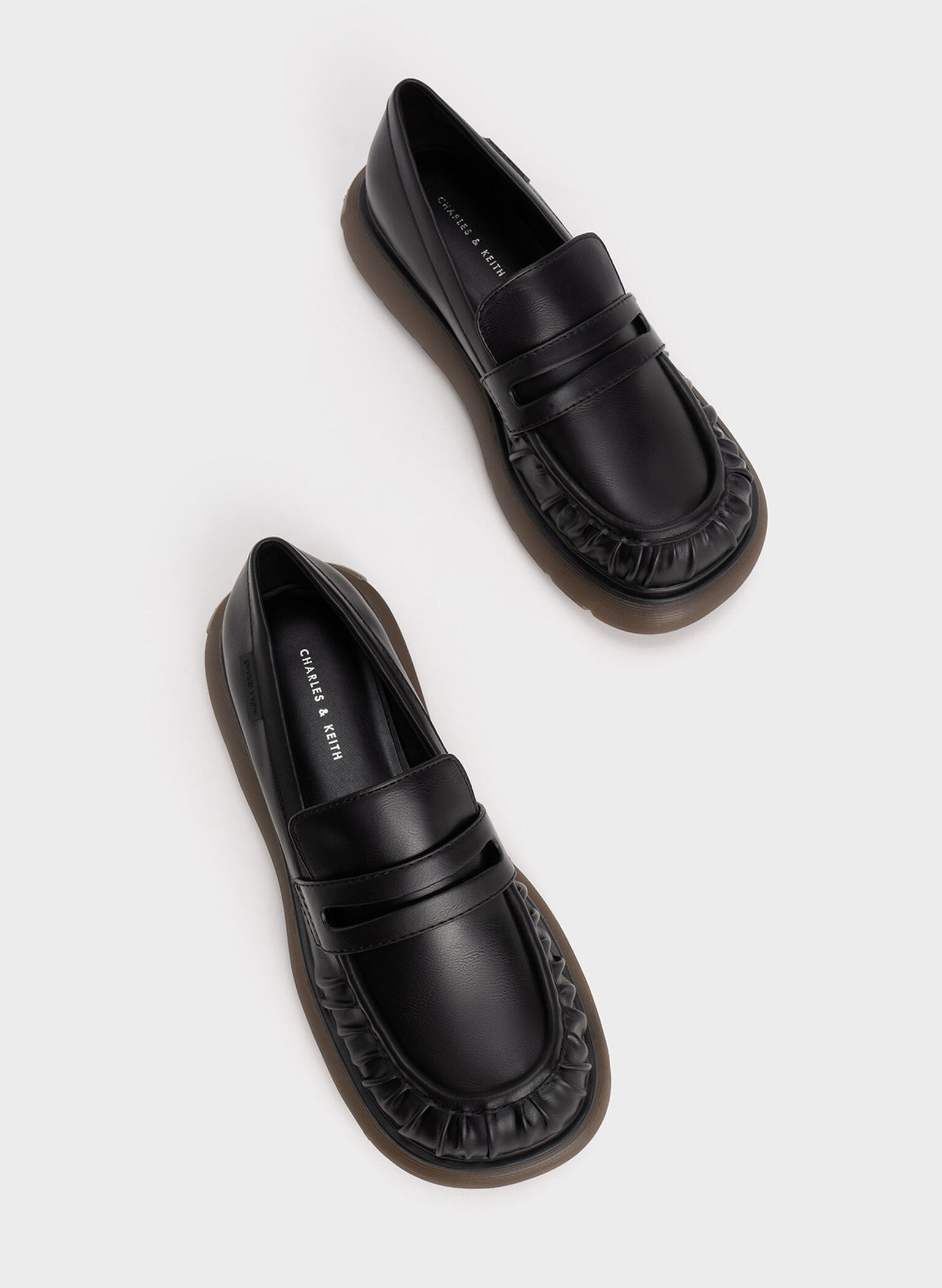 Collin Oversized Sole Penny Loafers Black