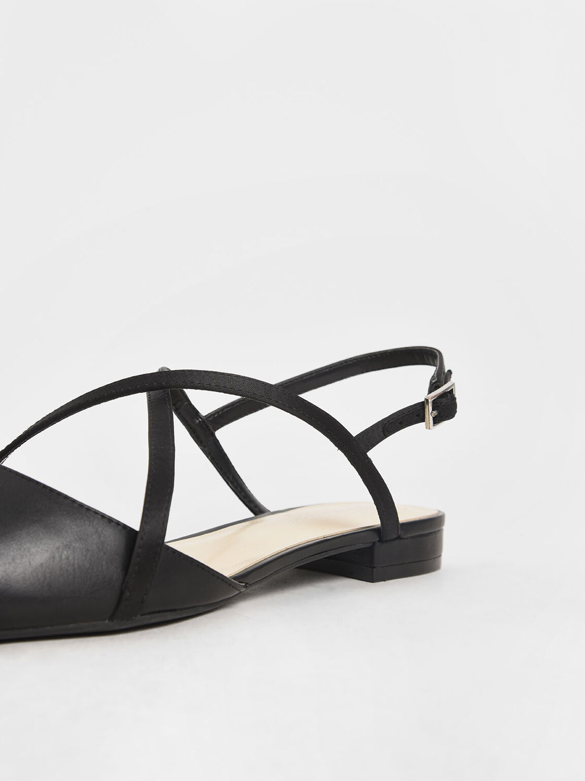 black criss cross flats