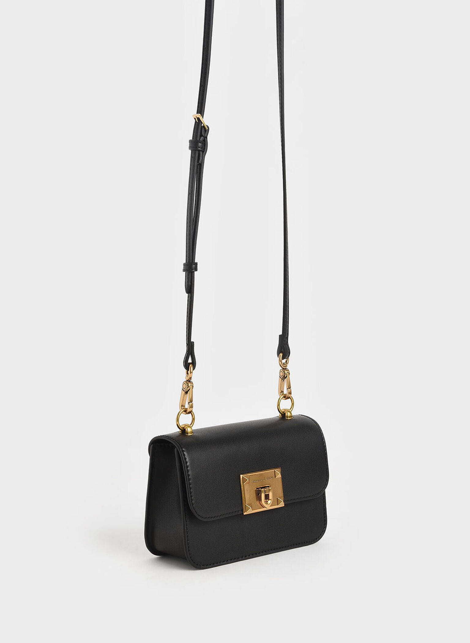 Black Metallic TurnLock Bag CHARLES & KEITH US