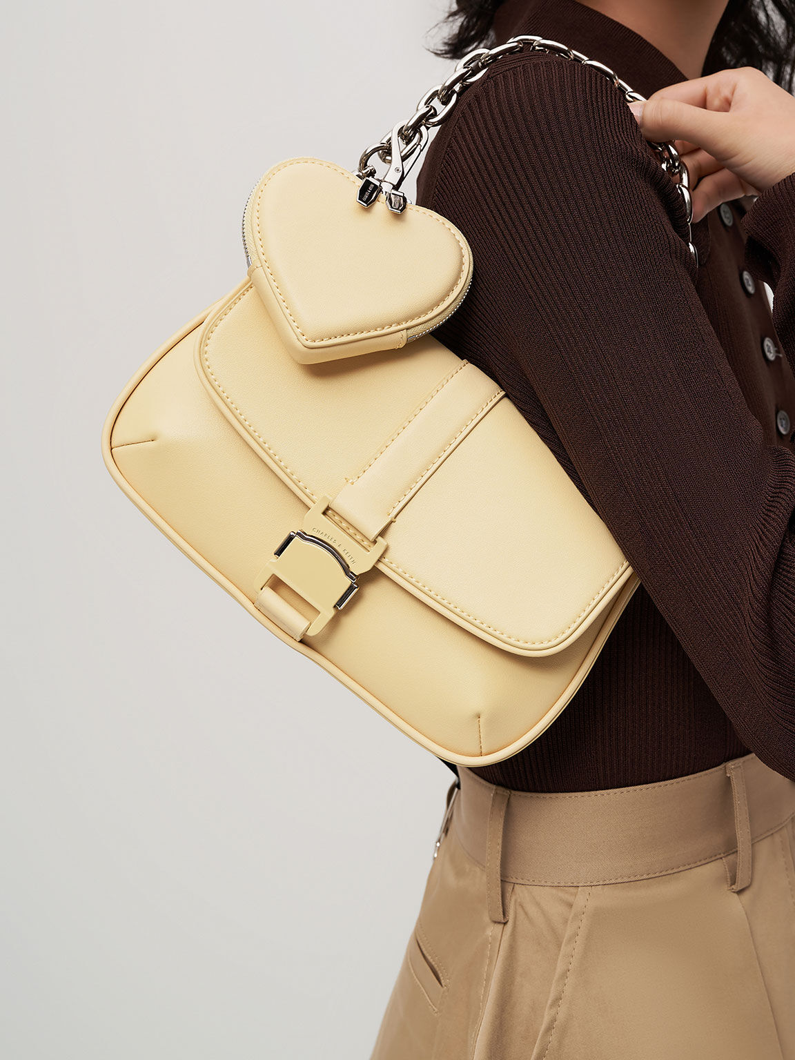 Buckle best sale crossbody bag