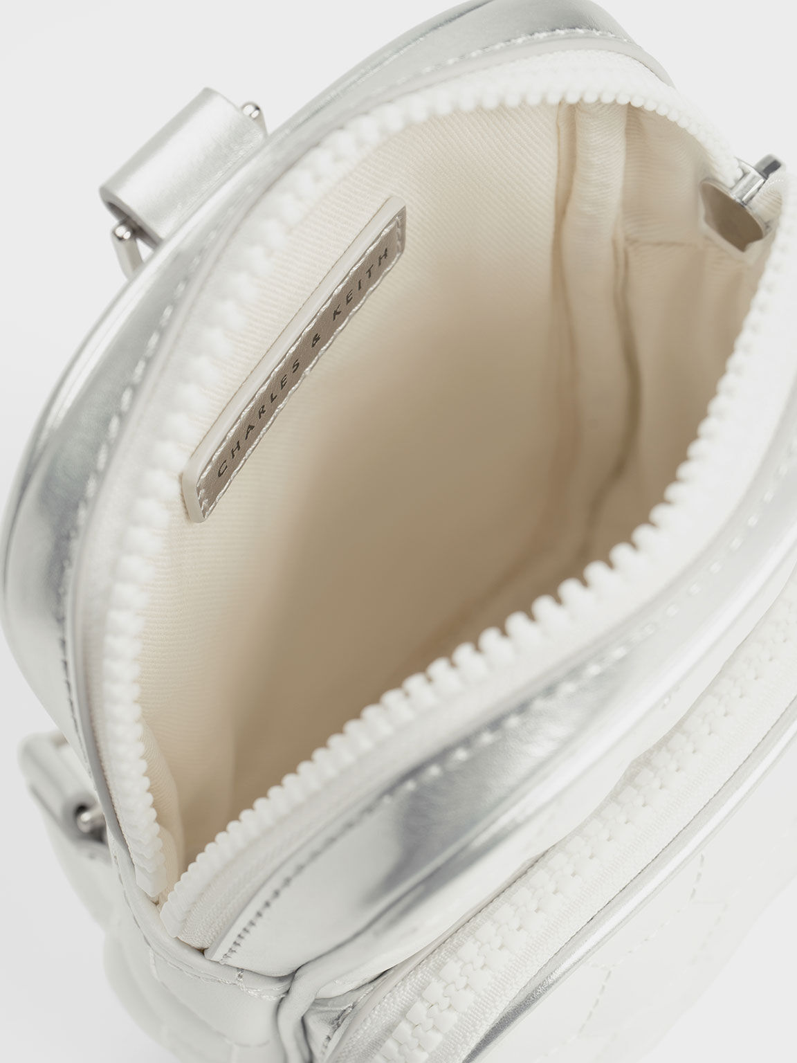 White Textured Elongated Crossbody Bag - CHARLES & KEITH US