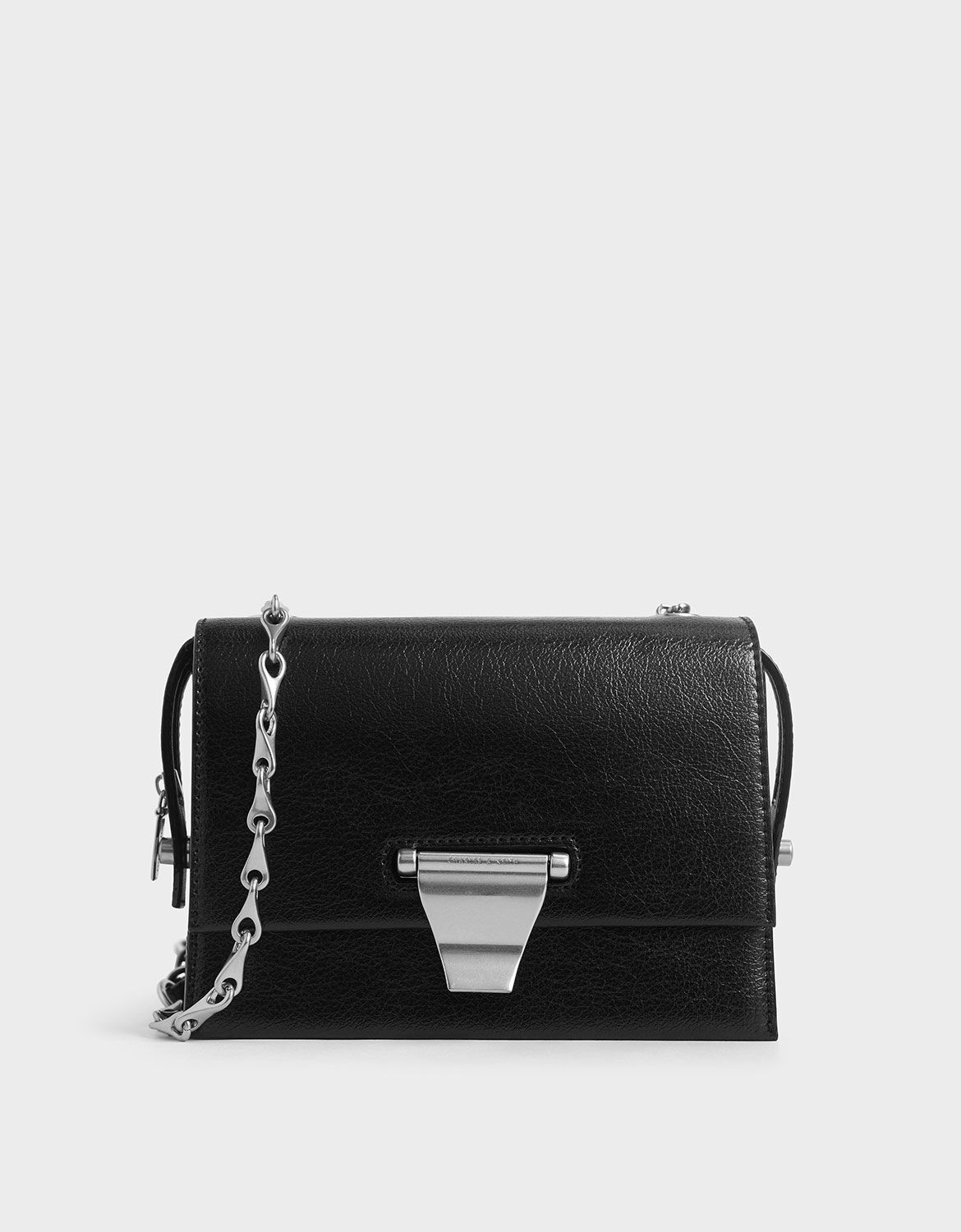 charles & keith metal push lock crossbody bag