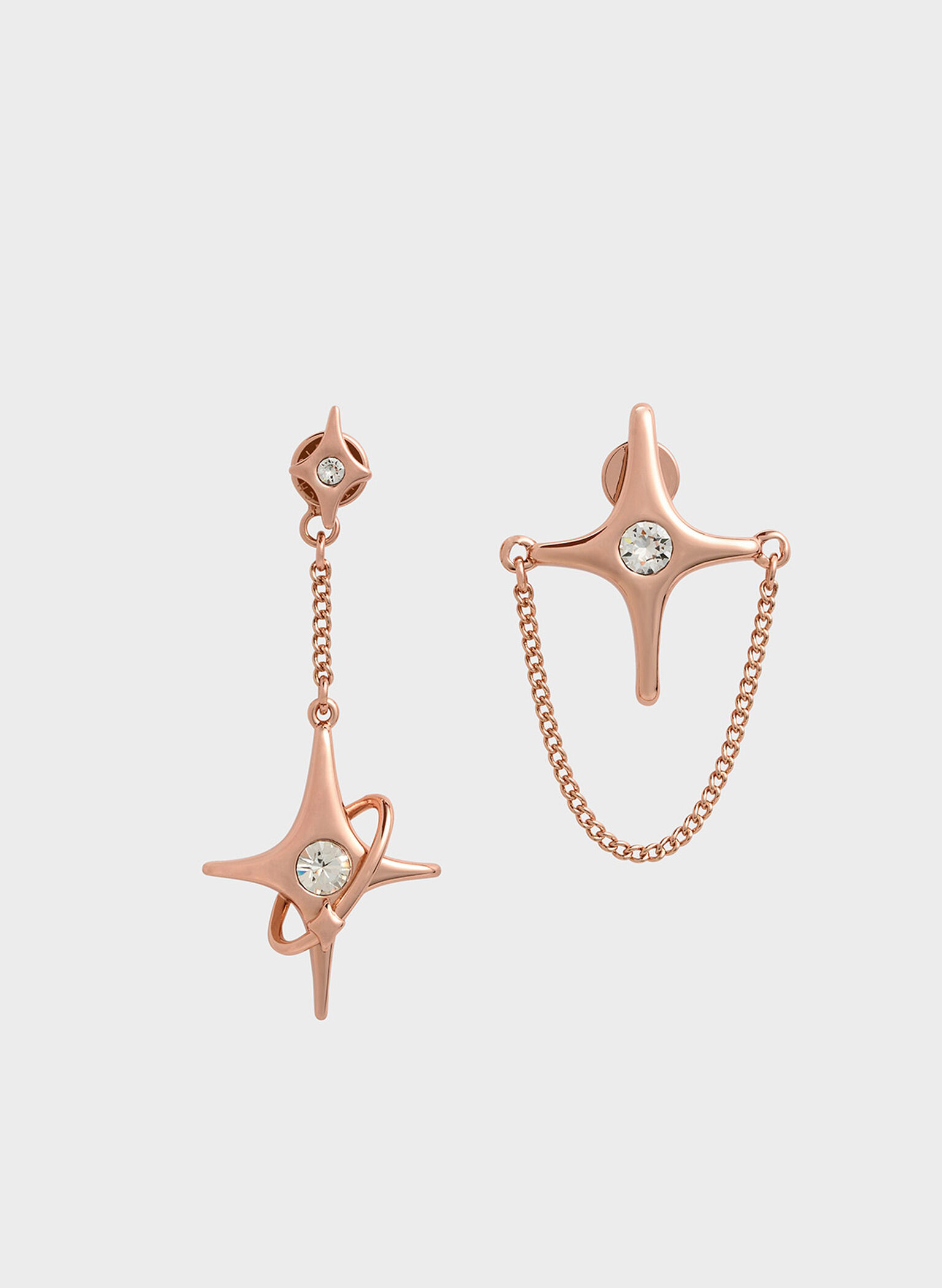 Pendientes asímetricos Estelle con detalles de estrella y cristal, Oro rosa, hi-res