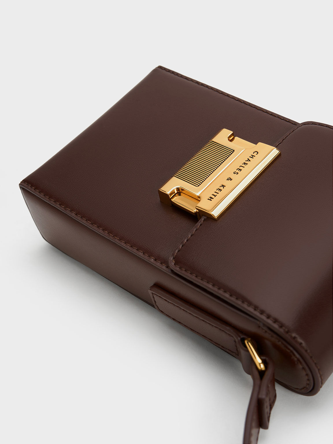 Freida Metallic Accent Elongated Pouch, Dark Brown, hi-res