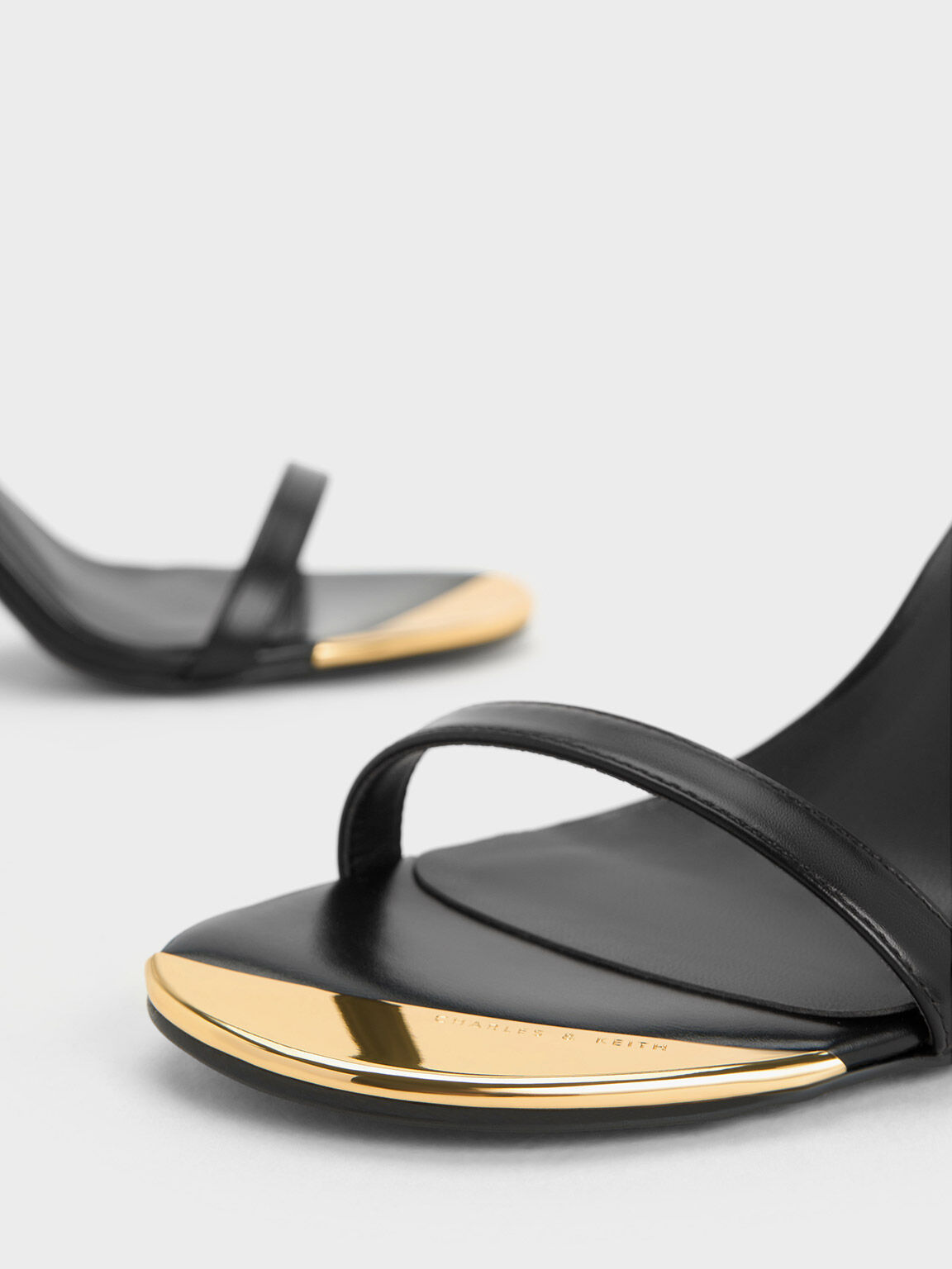 Black and gold on sale strappy heels