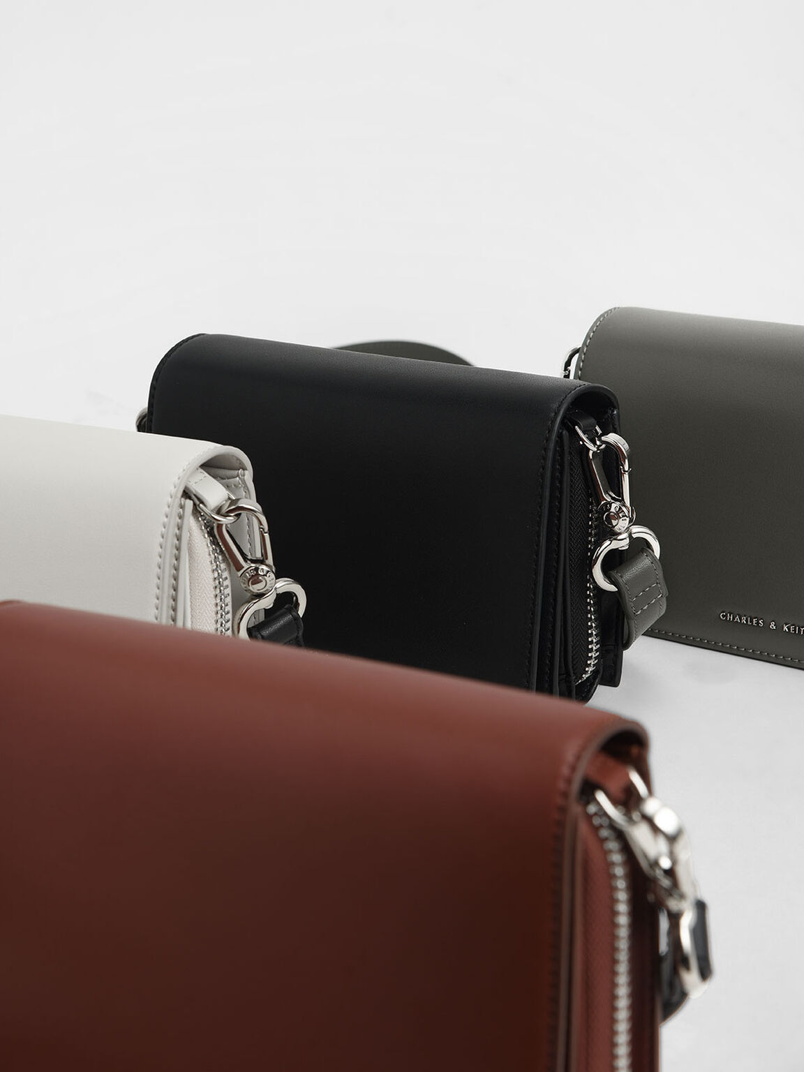 multi pouch crossbody bag charles and keith
