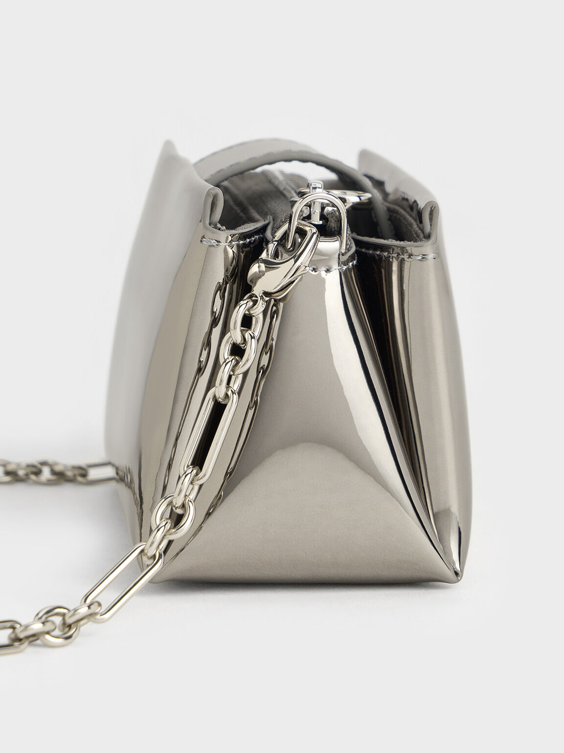 Pewter Bosie Metallic Top Handle Pouch - Pewter - CHARLES & KEITH US