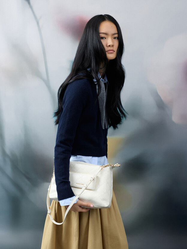 Bolso hobo acolchado con bolsillo delantero Duo, Crema, hi-res