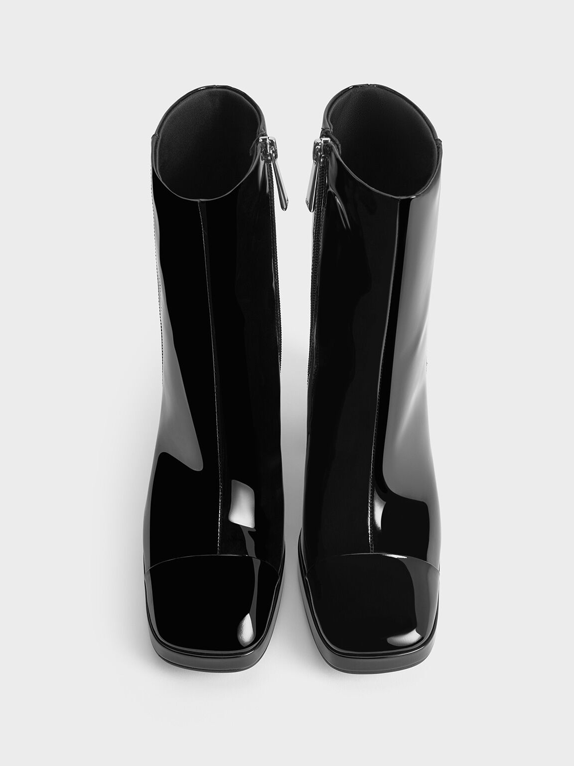 Shiny leather ankle boots top