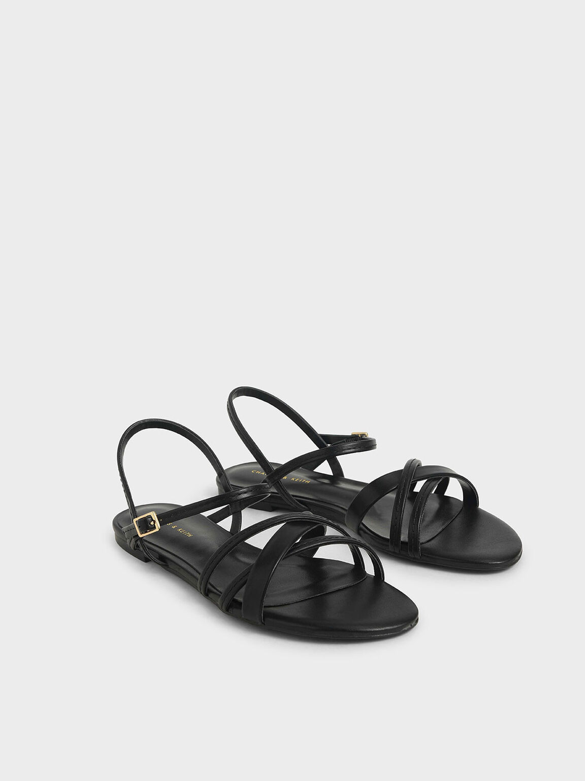 black criss cross flats