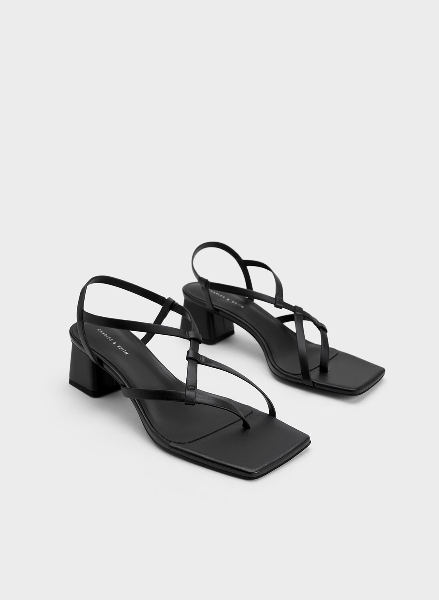 Black Asymmetric Interwoven Thong Sandals - CHARLES & KEITH MY