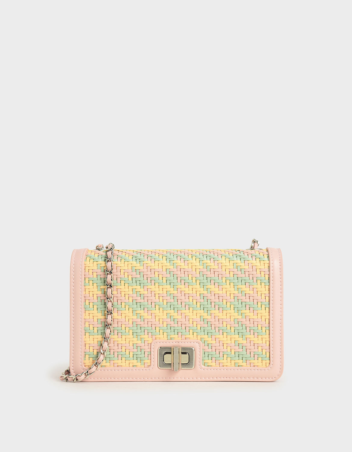 charles and keith woven turn lock clutch