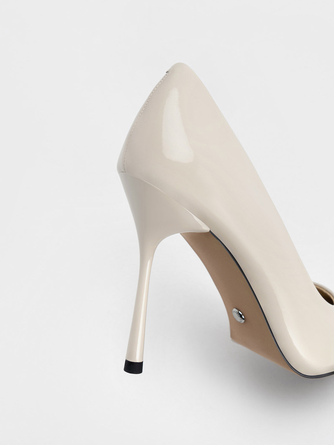 White patent shop leather pumps