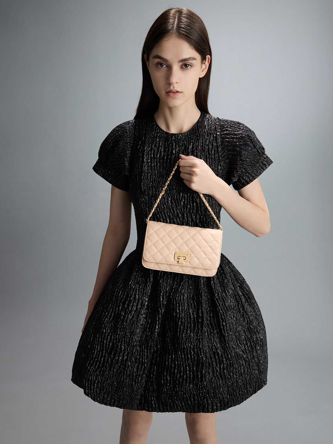 Charles and keith outlet quilted flip lock clutch