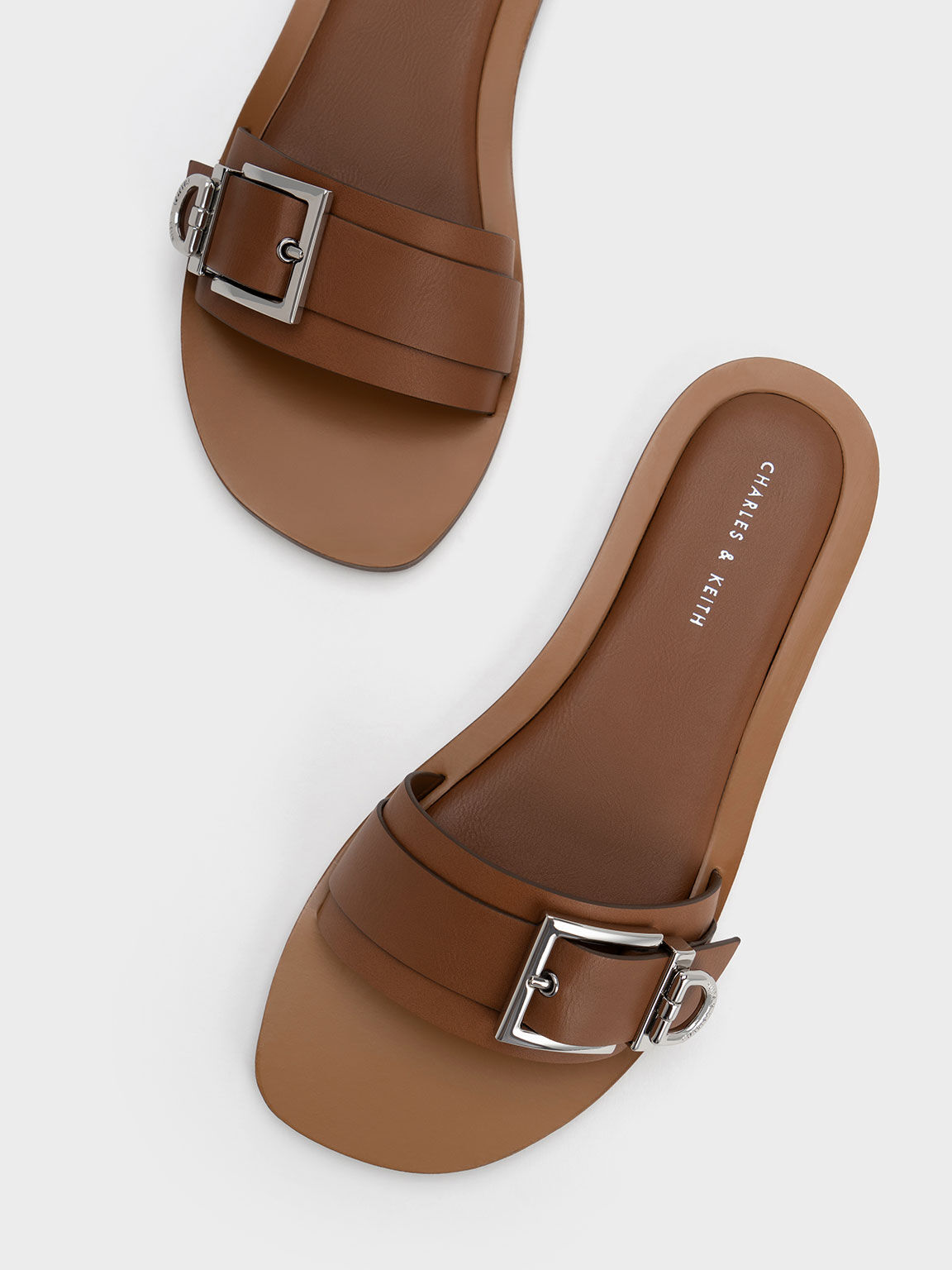 Slide sandals with buckle on sale