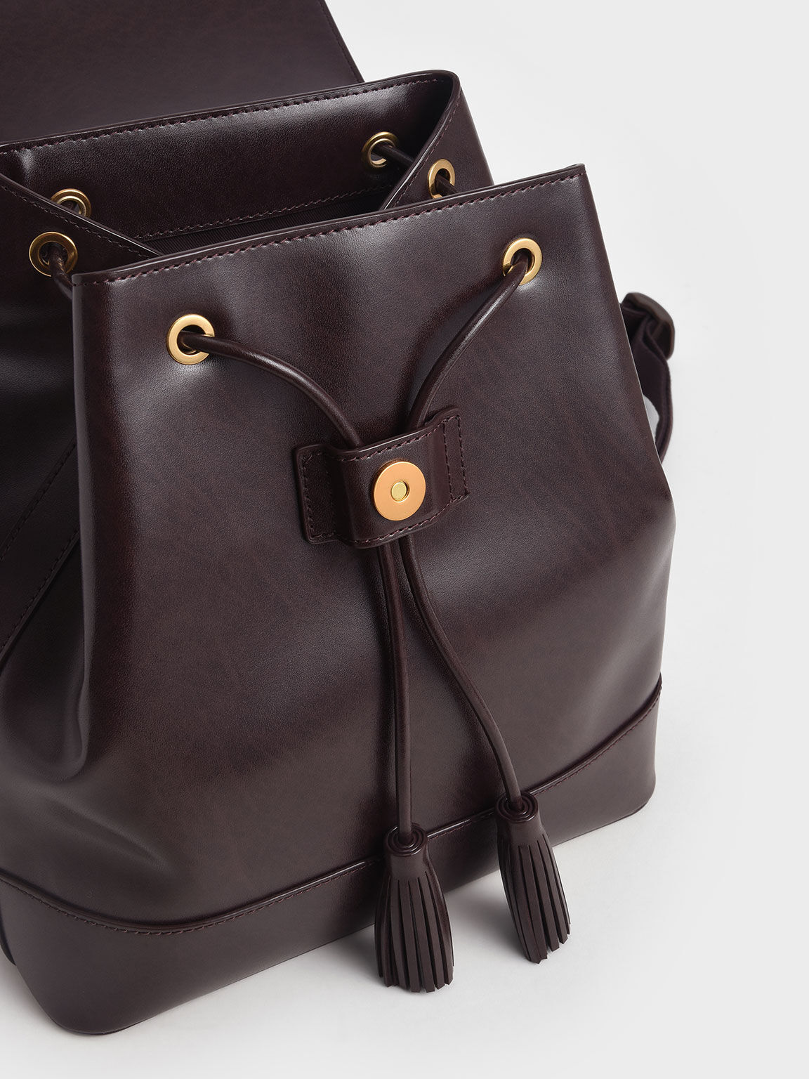 Dark Oak Genevieve Tassel Backpack CHARLES KEITH International
