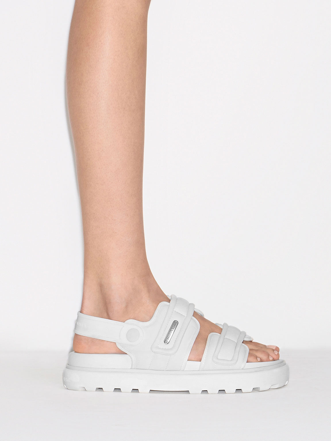 Fila disruptor sandals on feet top