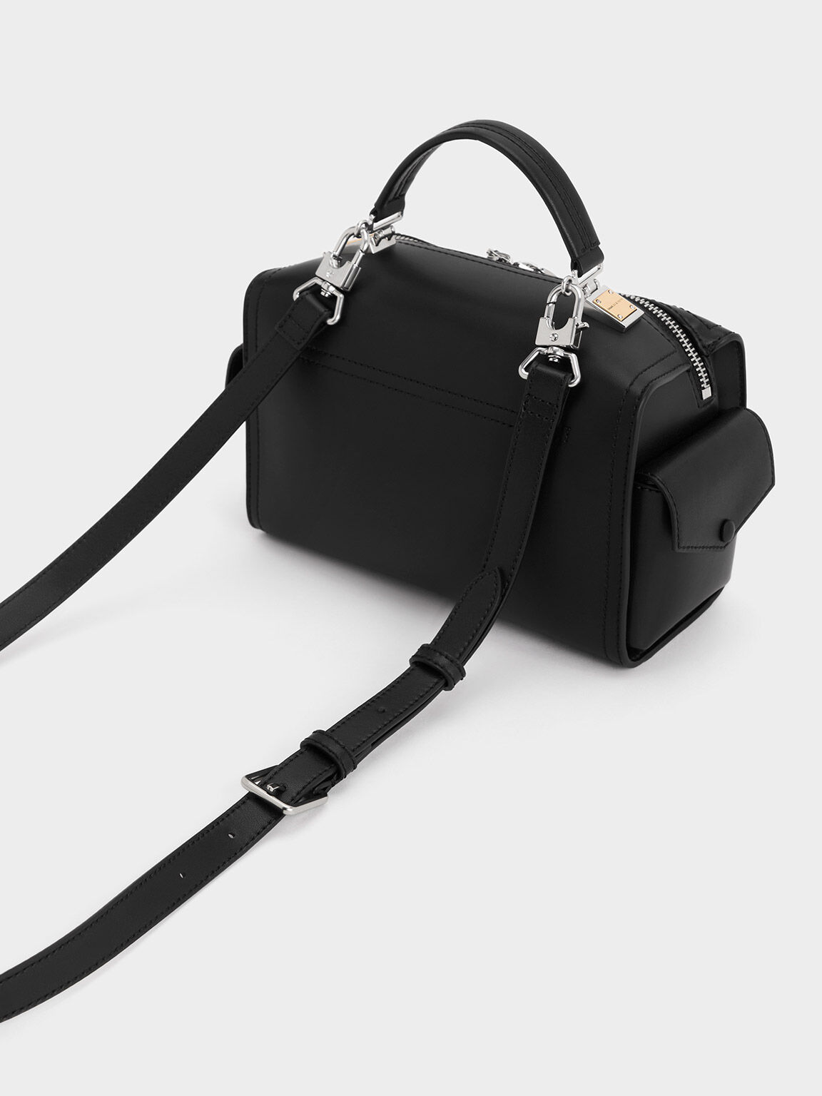 Top handle bag with store strap