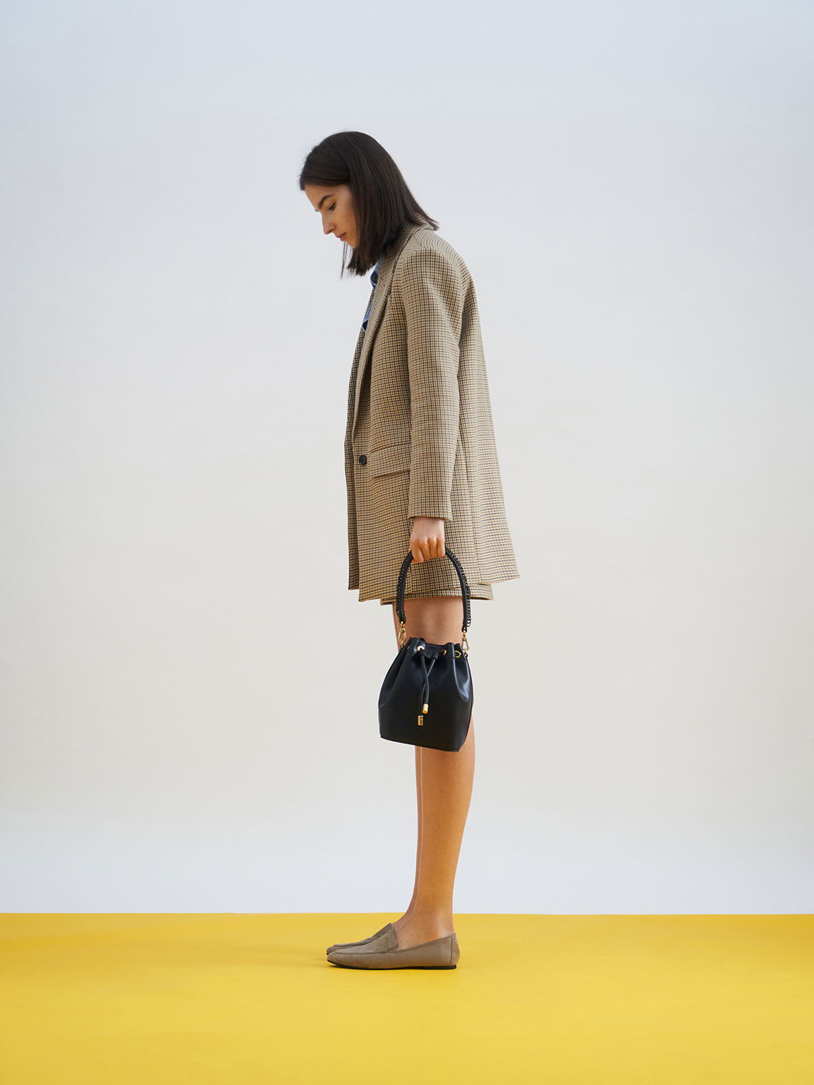 Black drawstring bucket bag on sale