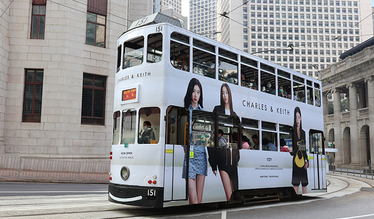 Images of CHARLES & KEITH’s Spring Summer 2023 camapaign with ITZY on Hong Kong’s iconic trams