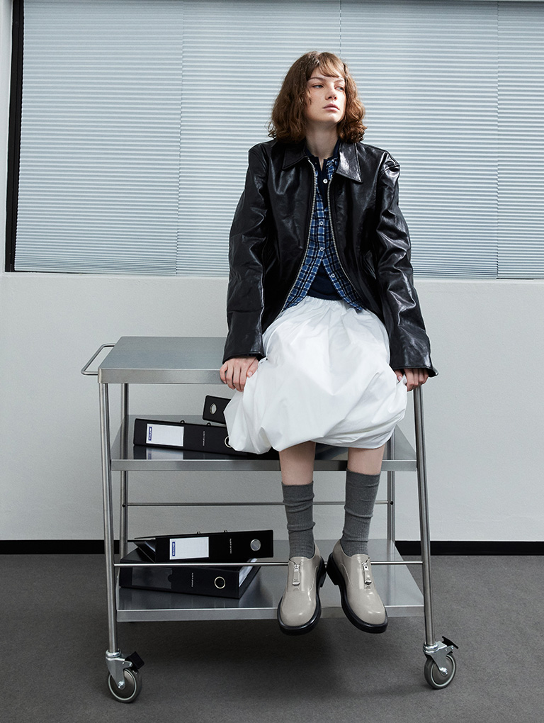 Women’s Nina leather zip-up loafers in grey (on model) – CHARLES & KEITH