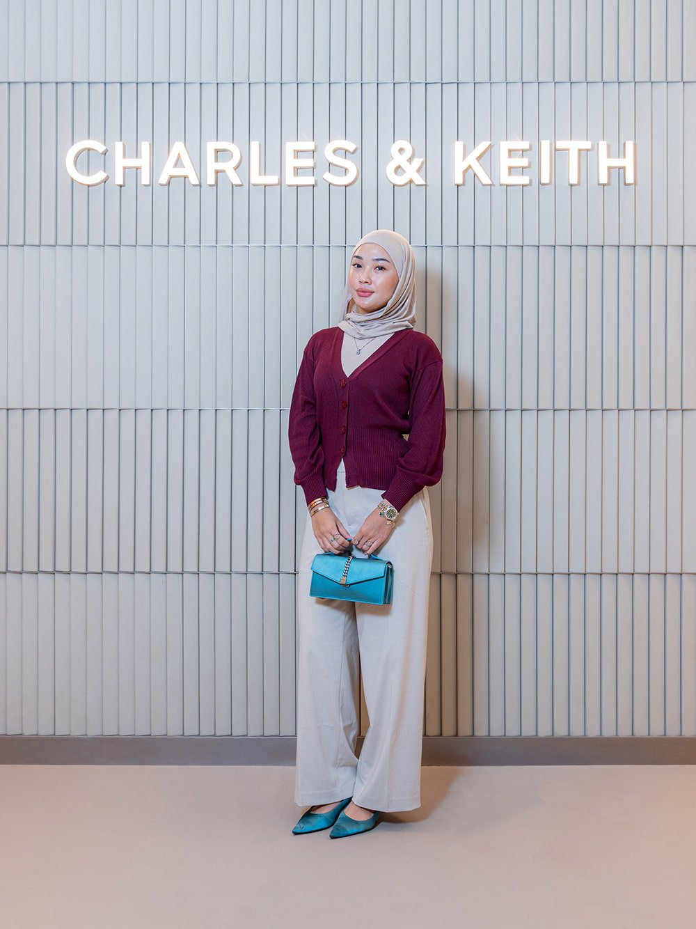 Taisia Satin Chain-Strap Envelope Bag in teal; Pointed Crystal-Heel Sling¬back Pumps in teal - CHARLES & KEITH