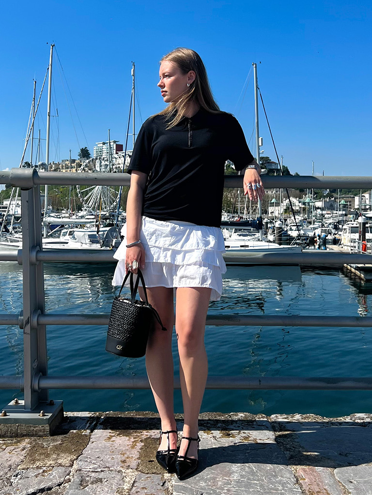 Women’s leather & raffia bucket bag in black and leather T-bar block-heel pumps in black box, as seen on Maddy Tooth - CHARLES & KEITH