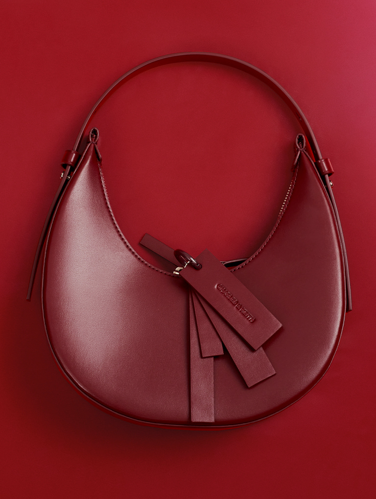 Women’s Cockade crescent hobo bag in burgundy - CHARLES & KEITH