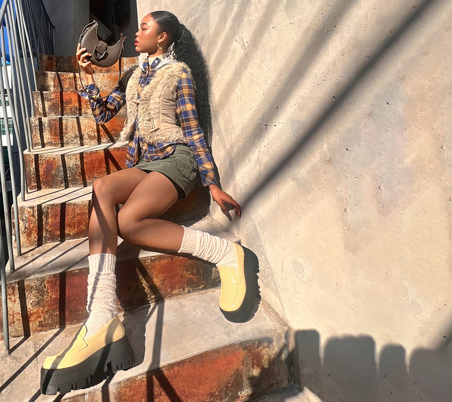 Women’s ITZY Gabine Belted Hobo Bag in dark moss; ITZY Rainier Chunky Platform Penny Loafers in yellow, as seen on Jenny Park - CHARLES & KEITH
