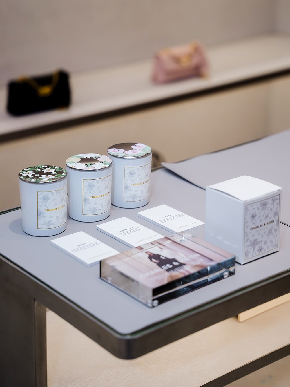 Taisia Satin Chain-Strap Envelope Bag in champagne - CHARLES & KEITH