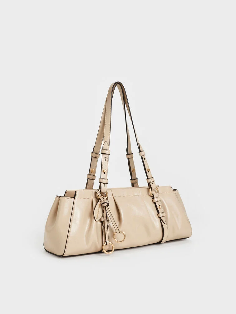 Britton ruched East-West bag in Oat.