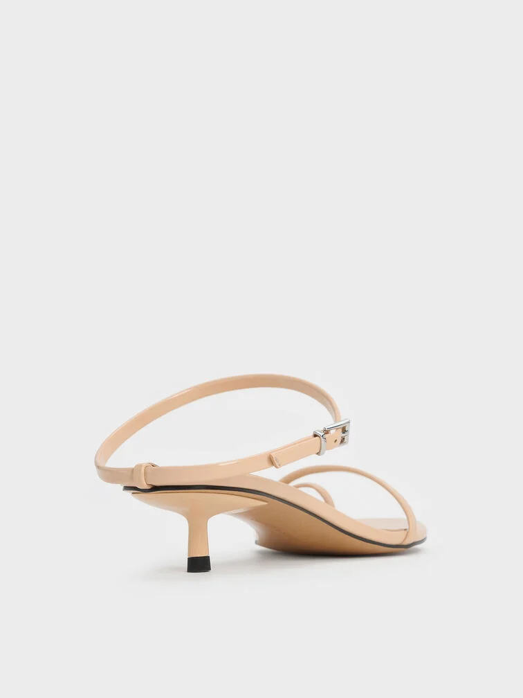 A low kitten heel that offers a subtle height lift, but still relatively close to the ground.