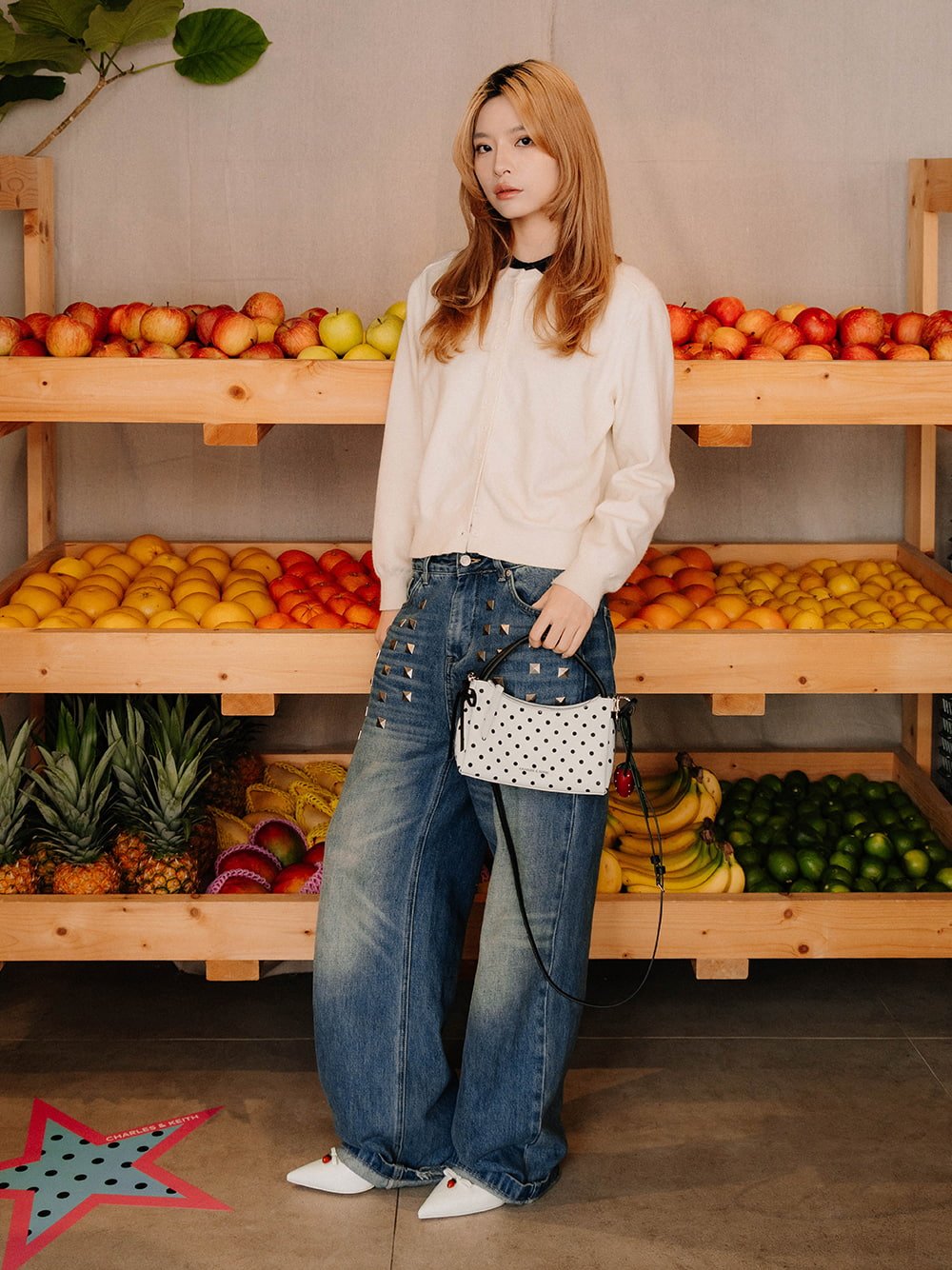 Hazel Bow Polka-Dot Top Handle Bag in cream and Sonali strawberry bow slingback pumps in white - CHARLES & KEITH