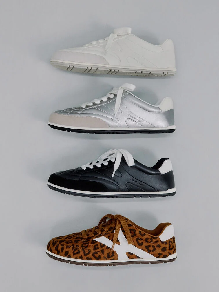 Low-top, flat-sole sneakers are a comfortable choice for court sports.