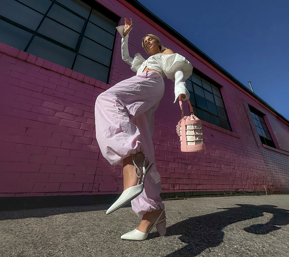 Women’s heart heel slingback pumps and heart motif caged bucket bag, as seen on Maxine Wylde   - CHARLES & KEITH