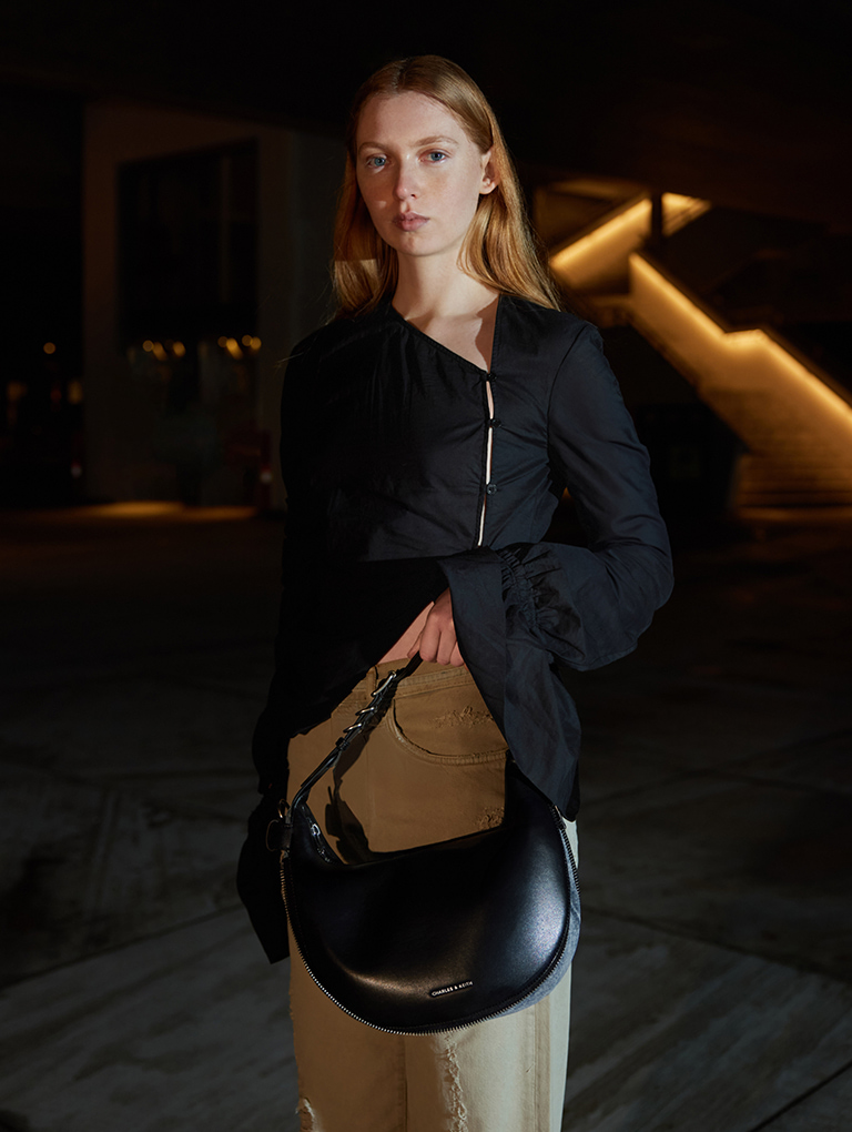 Women’s Saskia crescent hobo bag in noir - CHARLES & KEITH