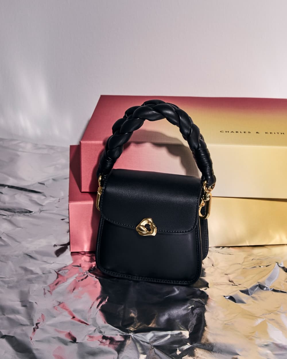Women's black Moira braided handle pouch - CHARLES & KEITH