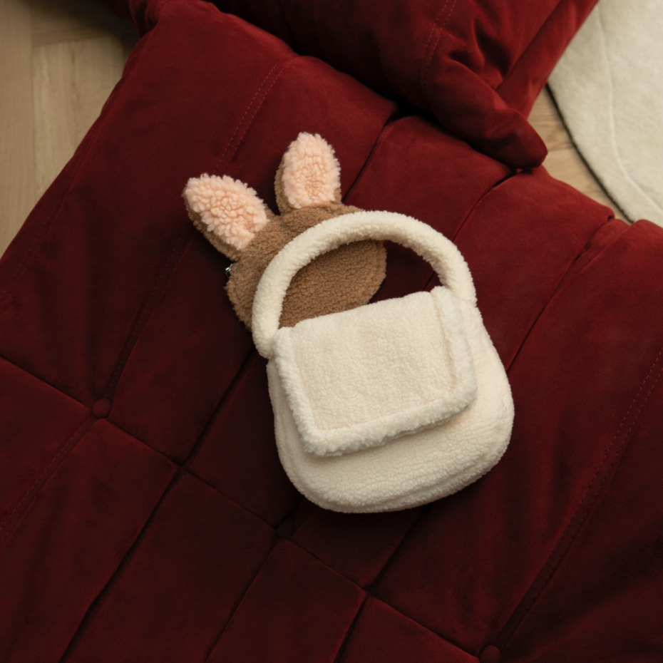 Girls’ furry top handle bag in chalk - CHARLES & KEITH