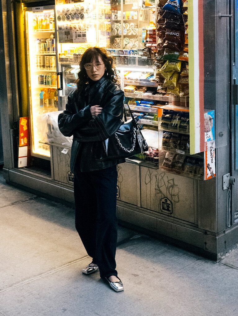 Women’s Andromeda chunky-chain trapeze XL tote bag in noir and metallic square-toe Mary Jane ballet flats in silver, as seen on Kristina Michelle Ang - CHARLES & KEITH