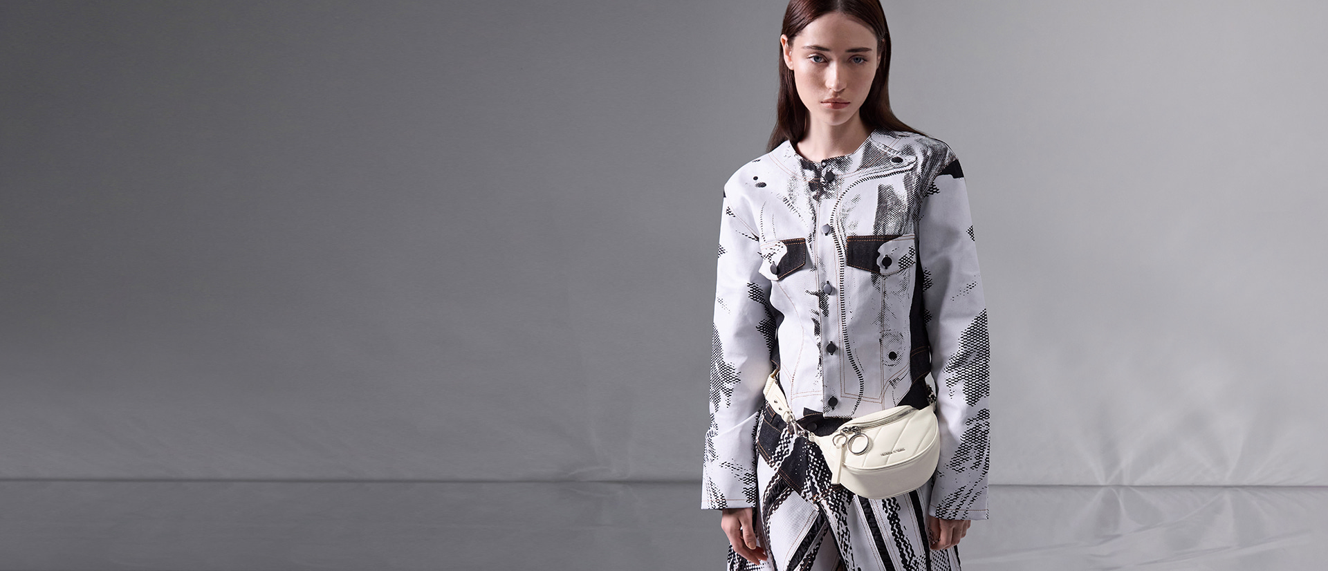 Women’s Philomena half-moon crossbody bag in cream  - CHARLES & KEITH