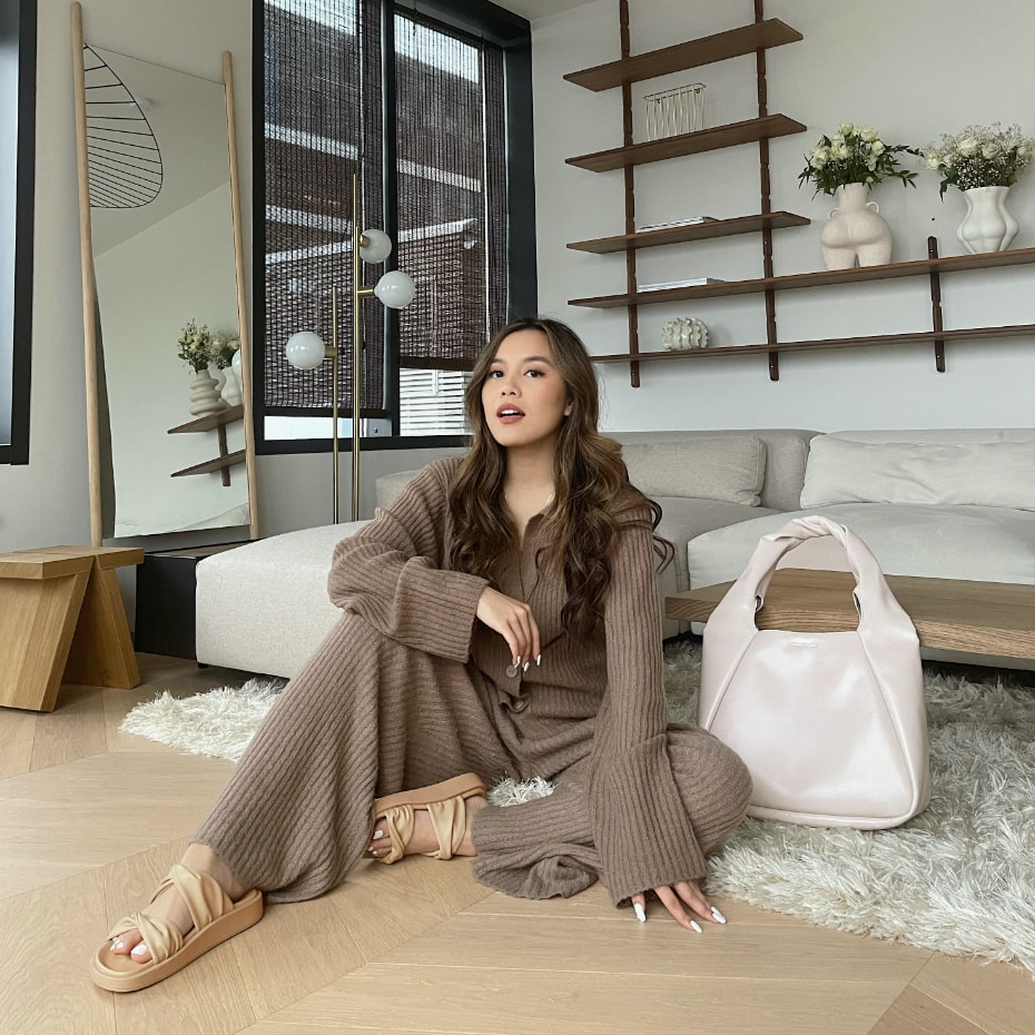 Women’s twist strap padded slide sandals in sand and twist handle large hobo bag in light grey, as seen on Alexandra Hoang - CHARLES & KEITH