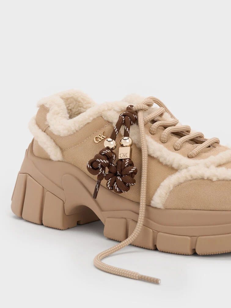 Chunky sneakers are characterised by their thick outsoles and bulky silhouette.  
