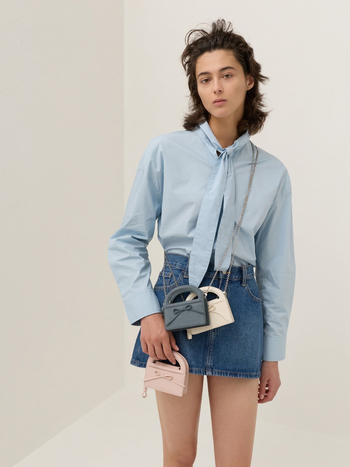 Smoky Blue Reese Bow Top Handle Wristlet - CHARLES & KEITH